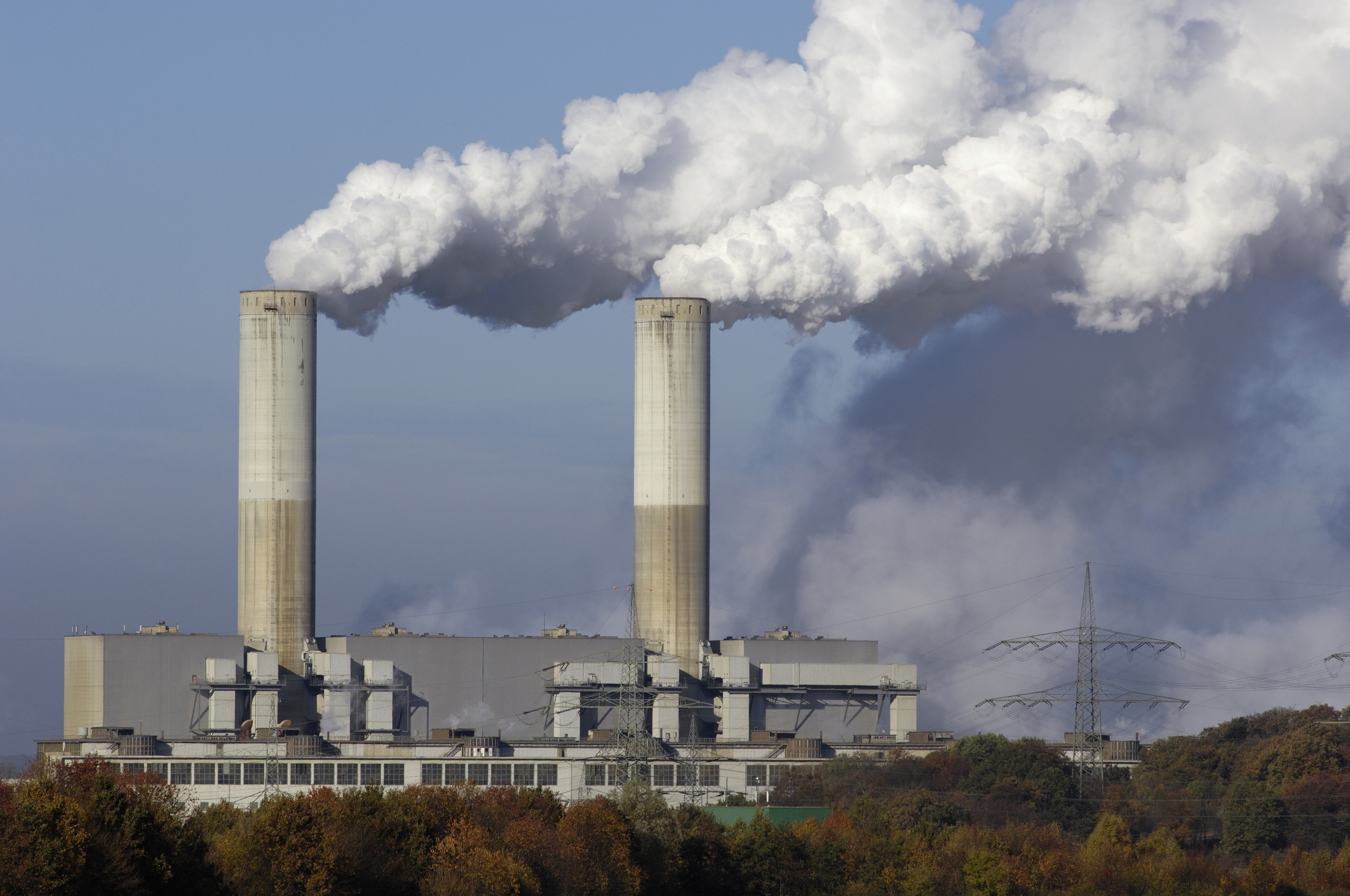 Is there an alternative to an expensive wet-extractive PM monitor on a stack with a wet FGD?